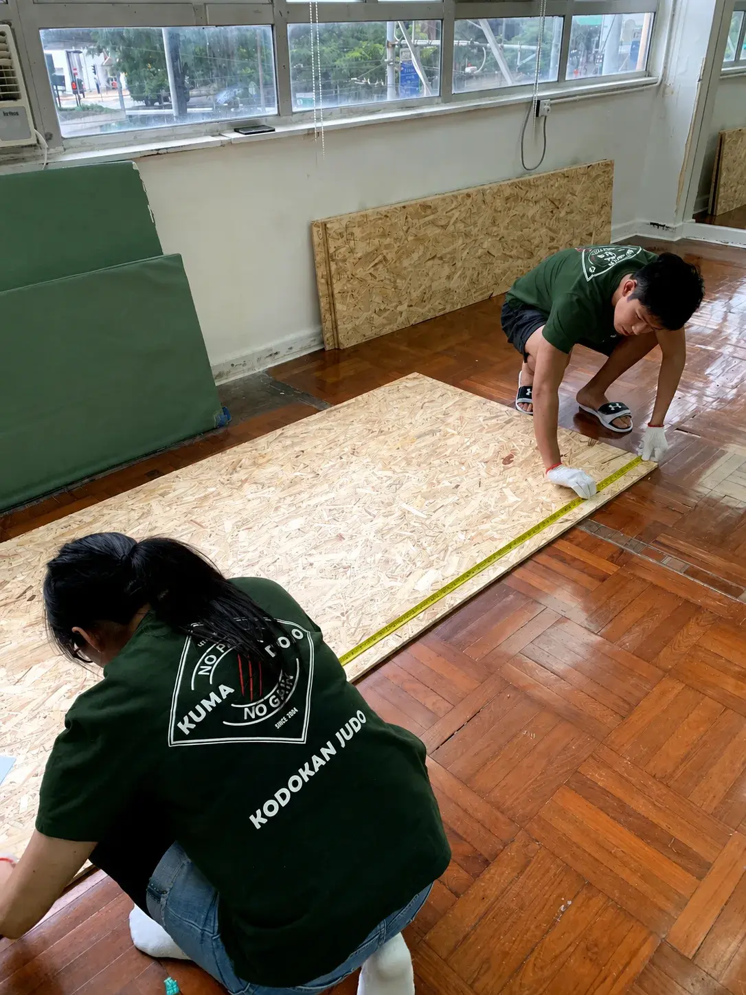Measuring a floor panel.